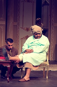 Kandeel trying to sooth the pain in the basha's leg. 